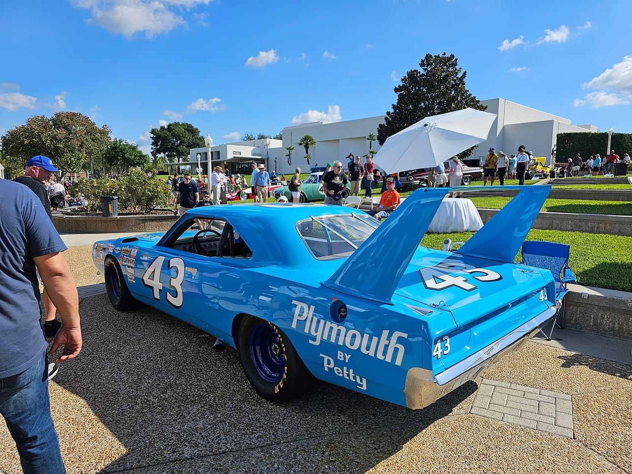 Classic show cars and visitors at the 2023 Lake Mirror Classic Concours d'Elegance, Lake Mirror Park, Lakeland, Florida.