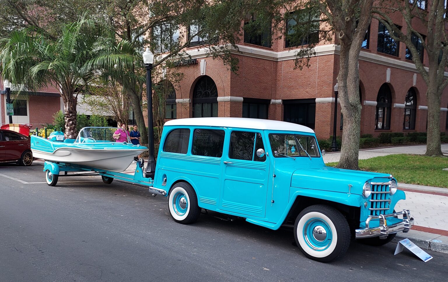 Classic cars and visitors at the 2022 Lake Mirror Classic Downtown Car Show in historic downtown Lakeland, Florida.
